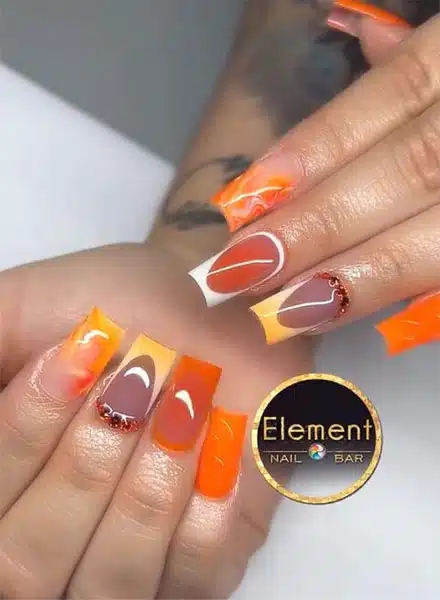 Custom acrylic nail art created at Element Nail Bar Arcadia