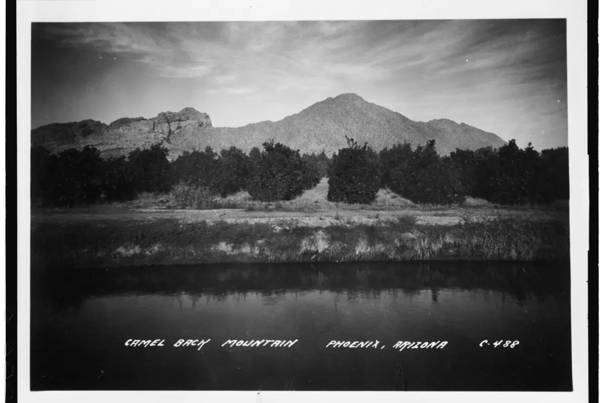 Historic Arizona Canal and citrus orchards with Camelback Mountain beyond